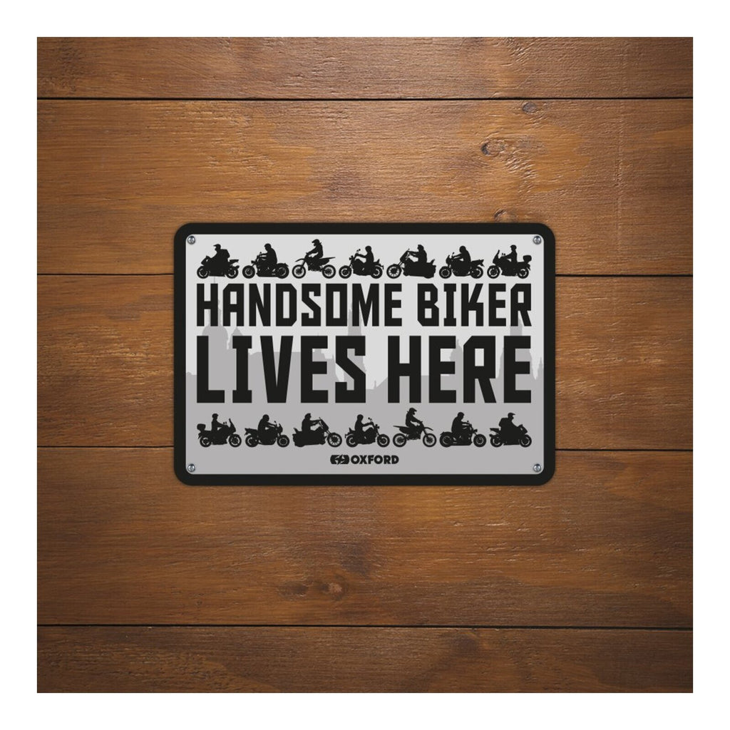 Oxford Garage Metal Sign: Handsome Biker Lives Here